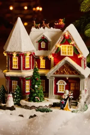 Casa del Villaggio di Natale illuminata, musicale e animata a pile (H23 cm) Camden Street Direttamente Dal Produttore
